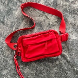 Brand new red sling bag